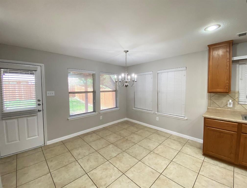 10608 Colfax Drive McKinney, TX 75072 - Photo 10 of 21 a view of an empty room with window and bathroom