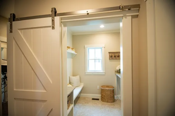 a bathroom with a shower and a toilet