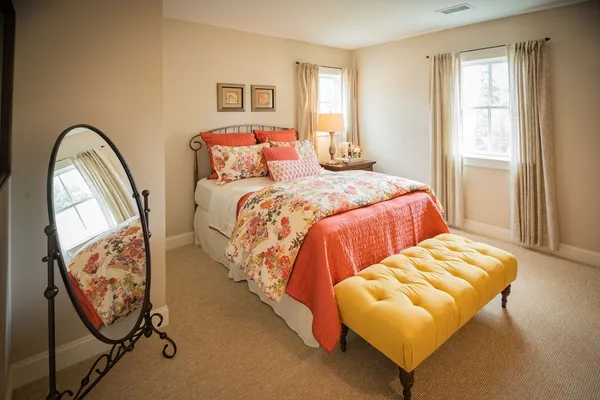 a bedroom with bed and a window