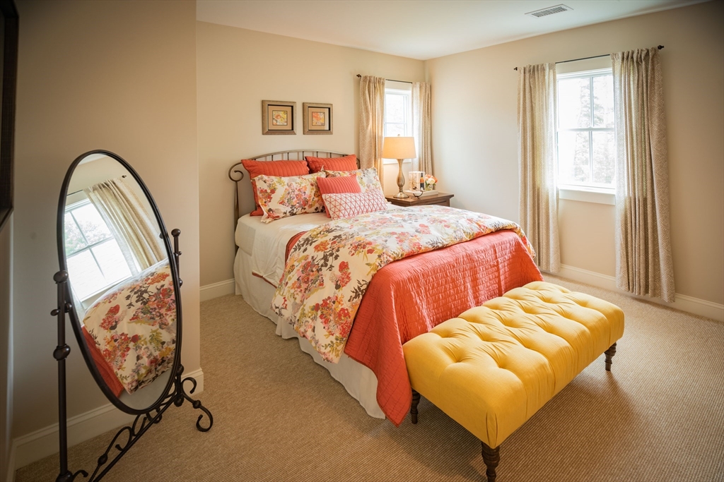 12 Wisteria Road Plymouth, MA 02360 - Photo 13 of 22 a bedroom with bed and a window