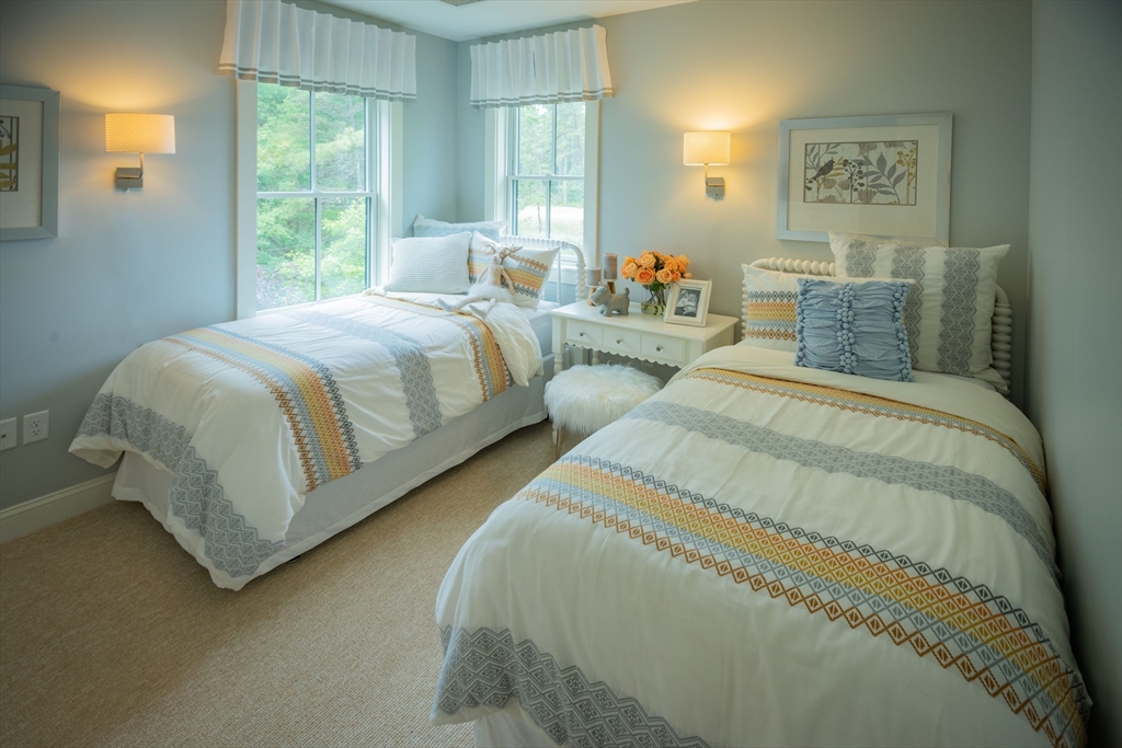 12 Wisteria Road Plymouth, MA 02360 - Photo 14 of 22 a bedroom with a bed and window