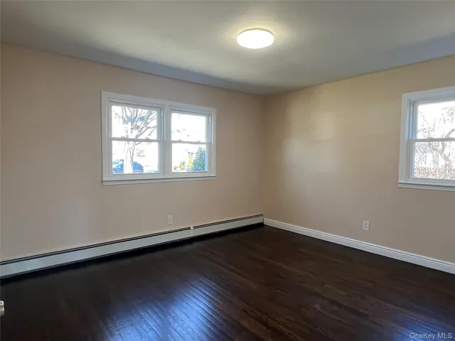 a bathroom with a shower curtain and a sink