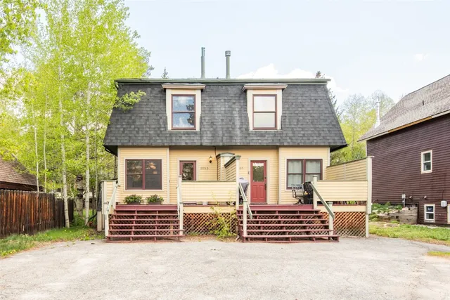 view of residential houses with outdoor space