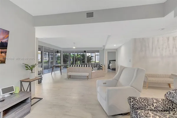 a living room with furniture and a table