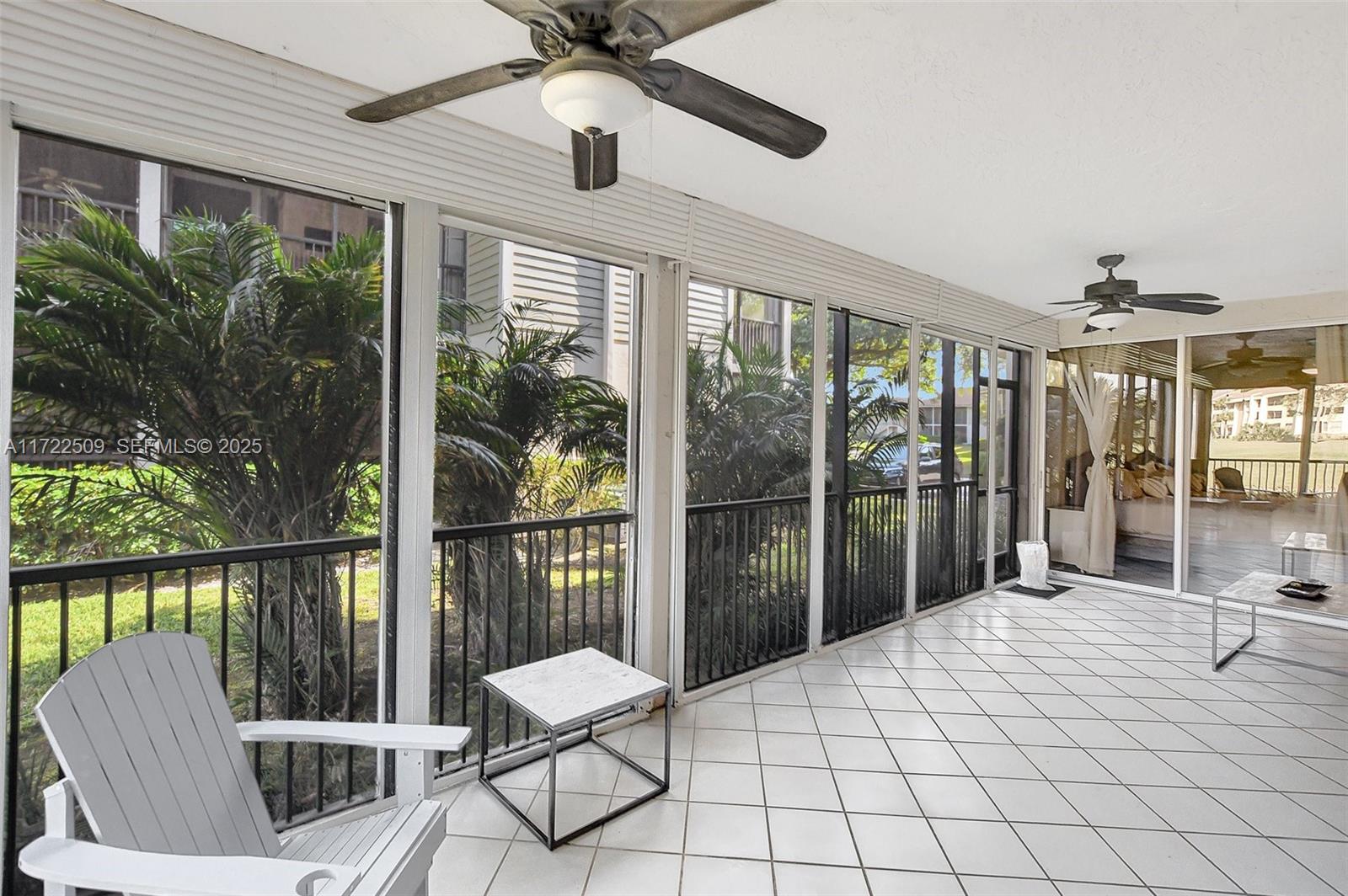 Boca Pointe Boca Raton, FL 33433 - Photo 27 of 32 a view of a balcony with chair and a potted plant
