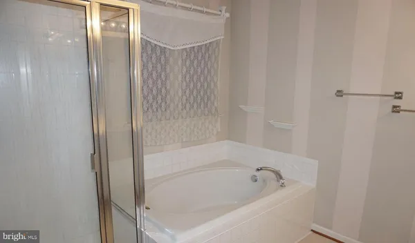 a bathroom with a bathtub