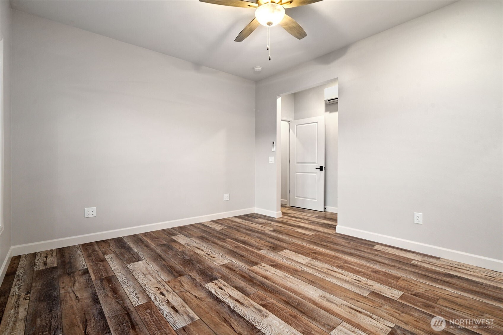 71 Heron Way, Unit A Sequim, WA 98382 - Photo 22 of 31 wooden floor in an empty room