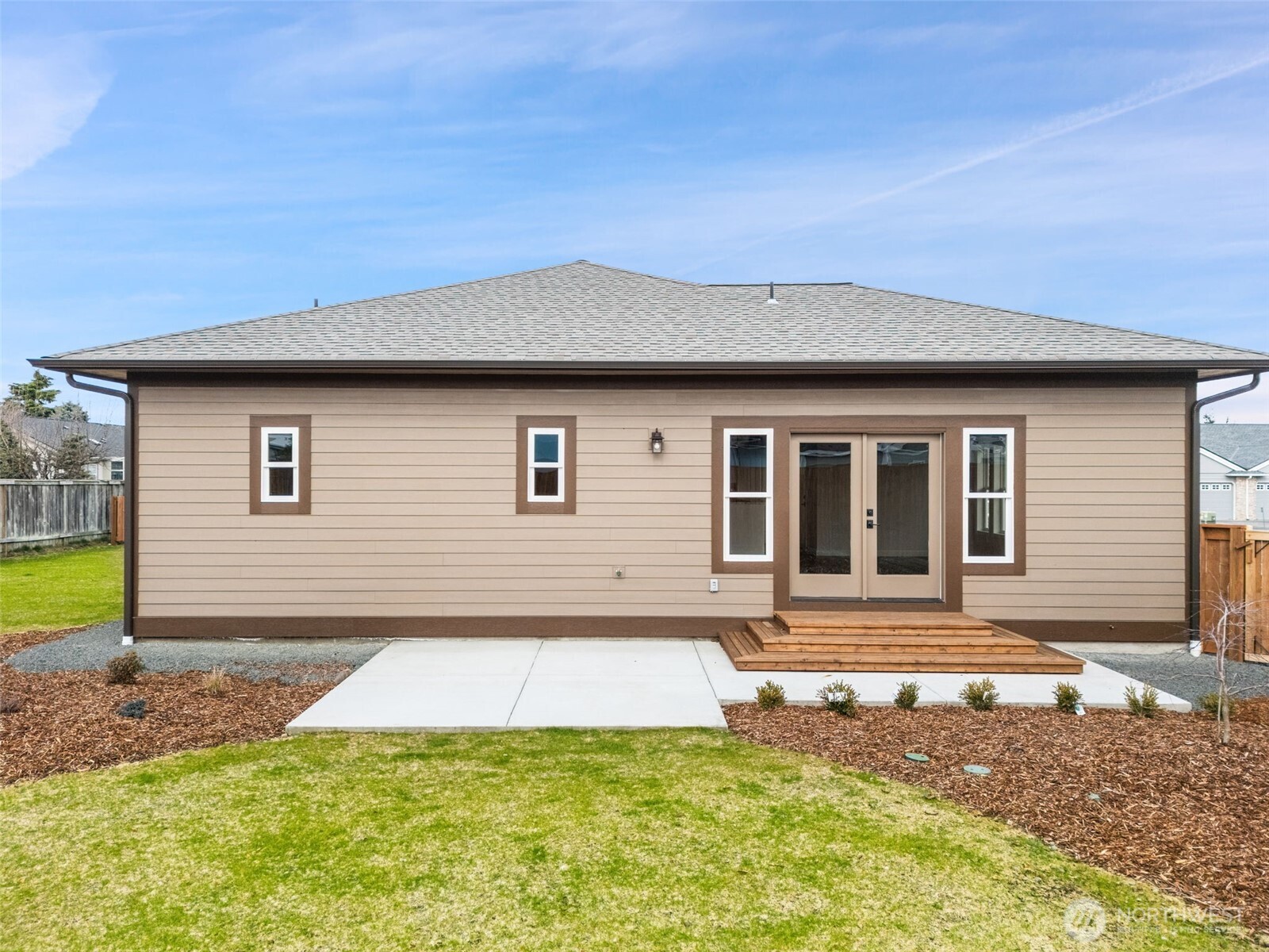 71 Heron Way, Unit B Sequim, WA 98382 - Photo 28 of 33 a house view with a backyard space