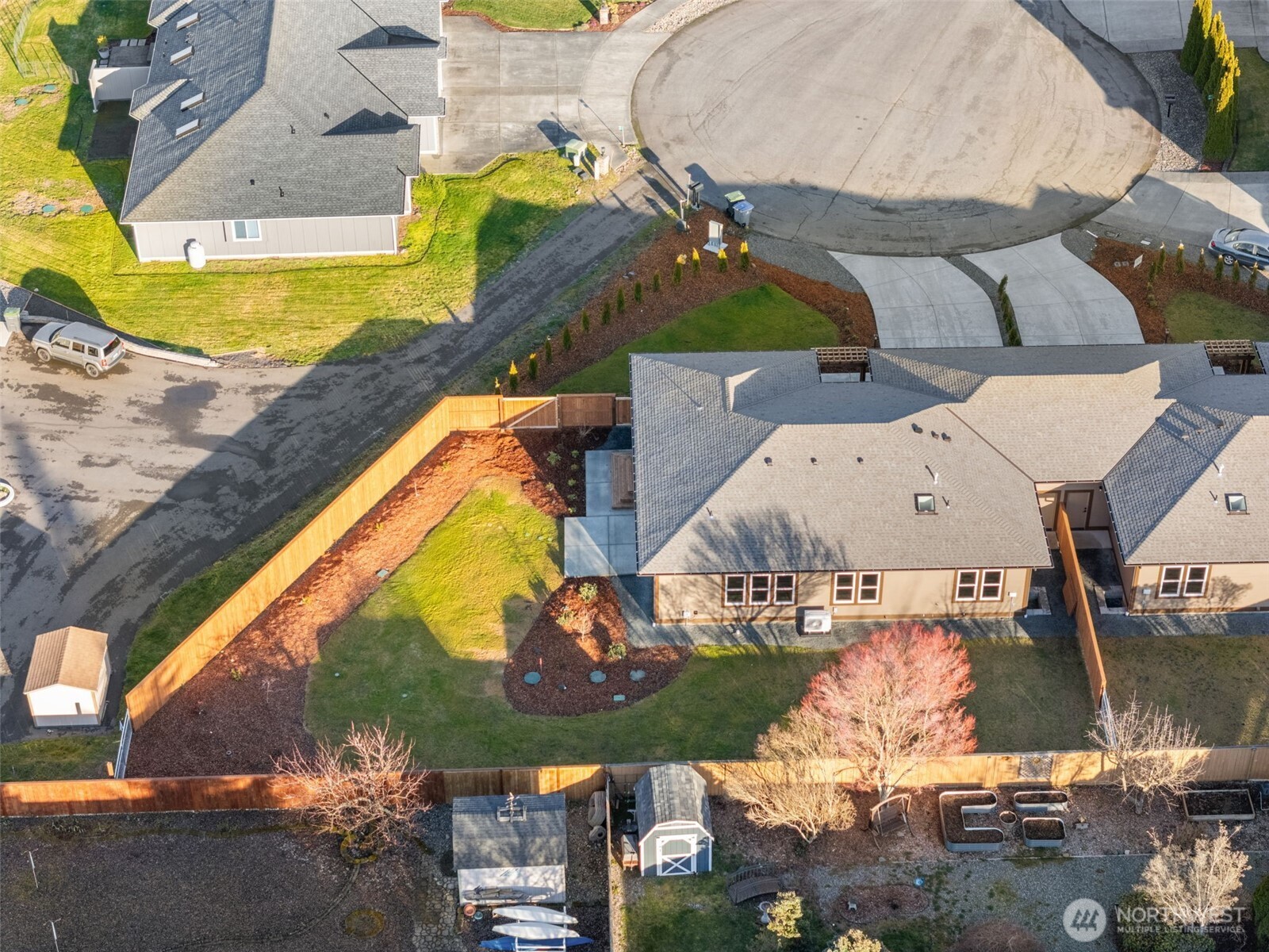 71 Heron Way, Unit A Sequim, WA 98382 - Photo 29 of 31 an aerial view of residential houses with outdoor space