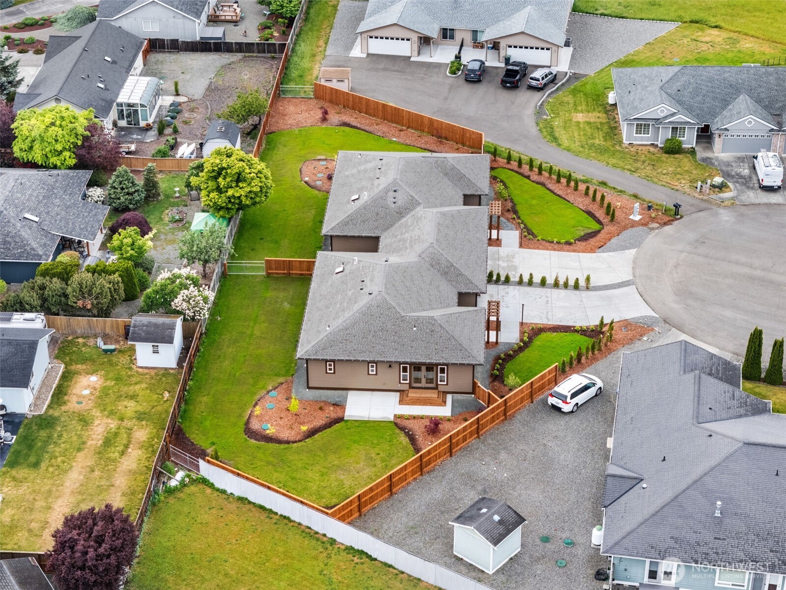 71 Heron Way, Unit B Sequim, WA 98382 - Photo 30 of 33 an aerial view of a house with swimming pool