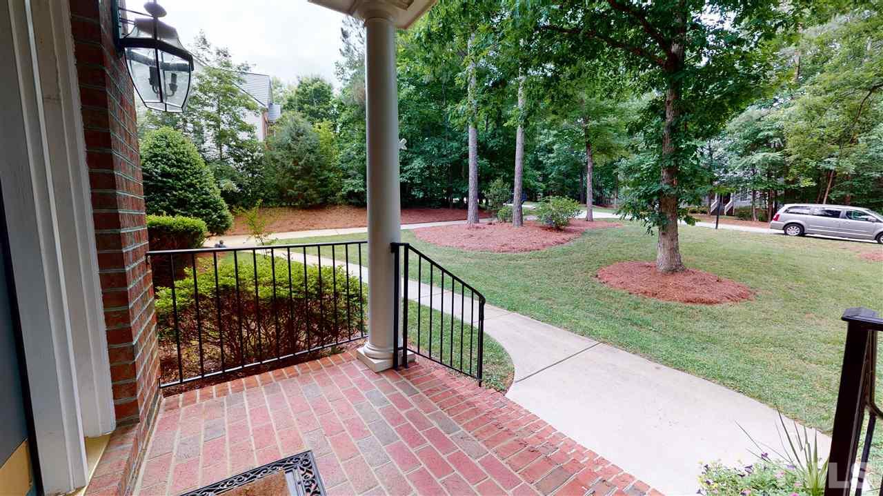 8005 Millenium Drive Raleigh, NC 27614 - Photo 3 of 30 a view of a garden and deck