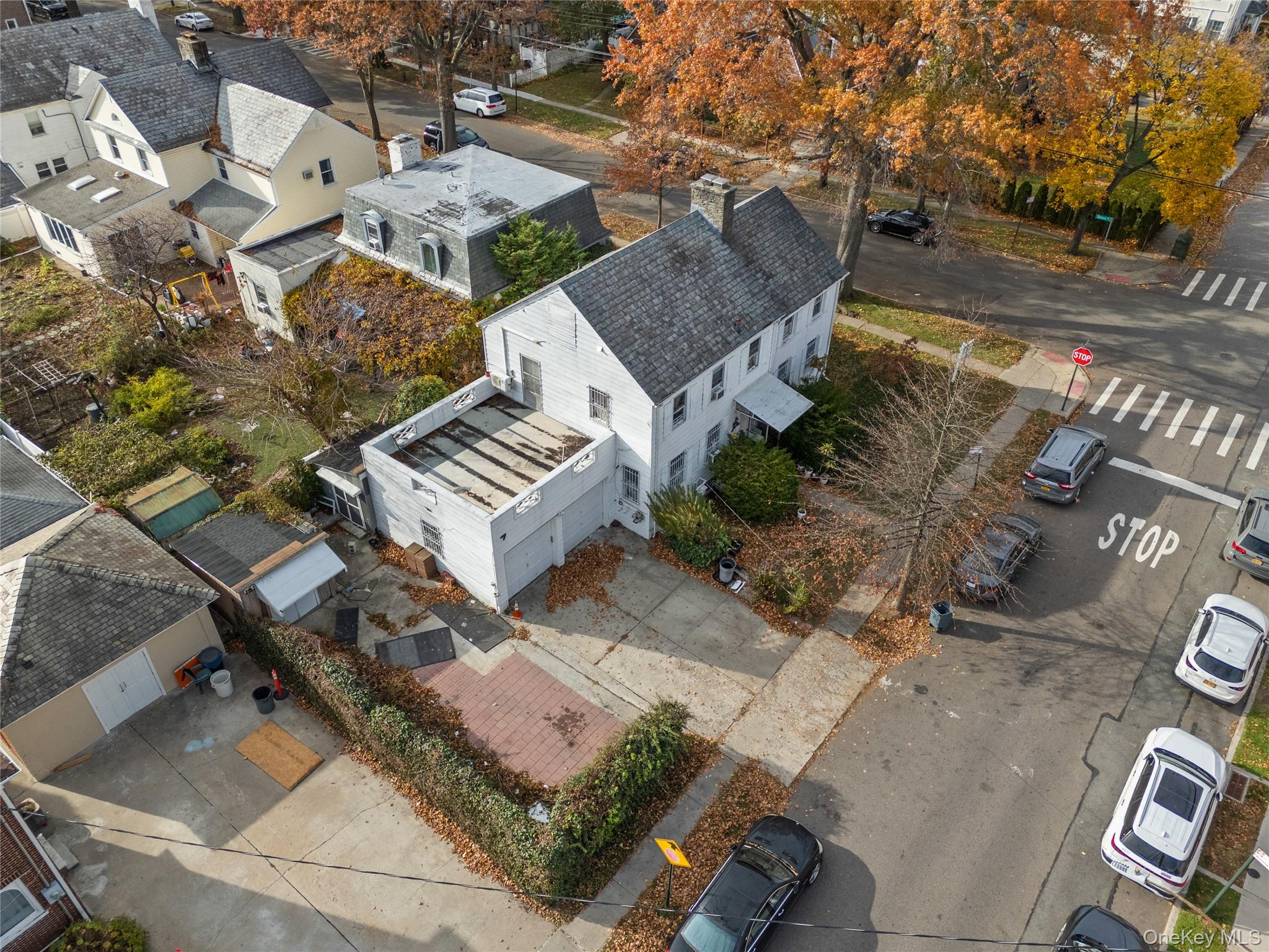52-06 Bowne Street Queens, NY 11355 - Photo 16 of 17 an aerial view of a house with outdoor space