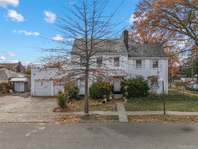 a view of a house with a street