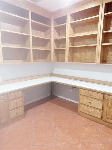 a view of an empty room with empty racks