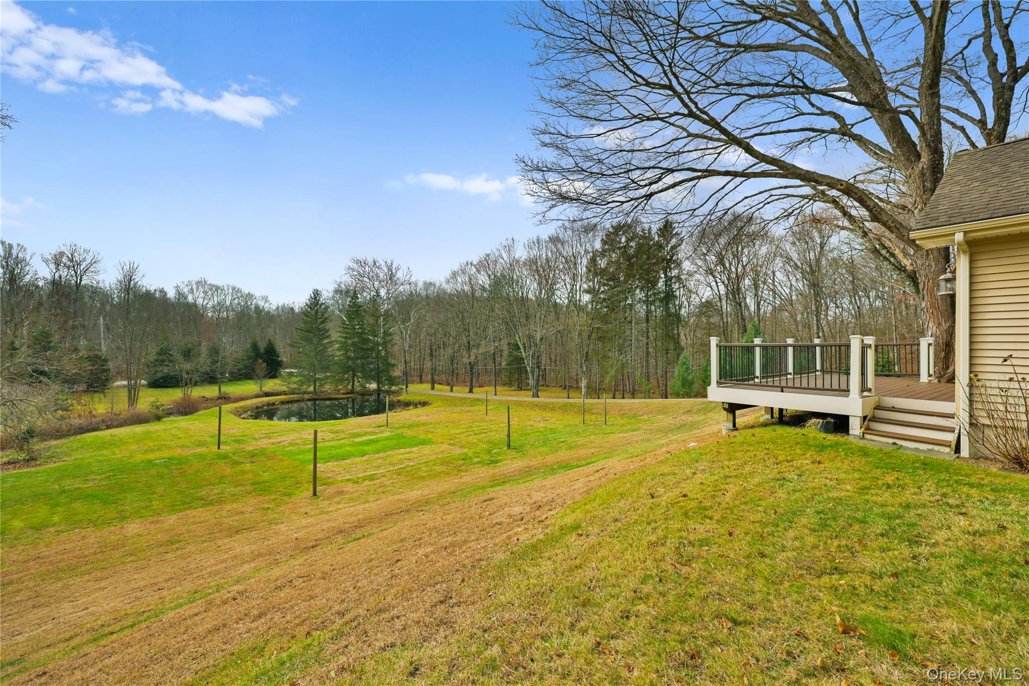 353 Turk Hill Road Brewster, NY 10509 - Photo 7 of 31 View of grassy yard featuring a deck with water view