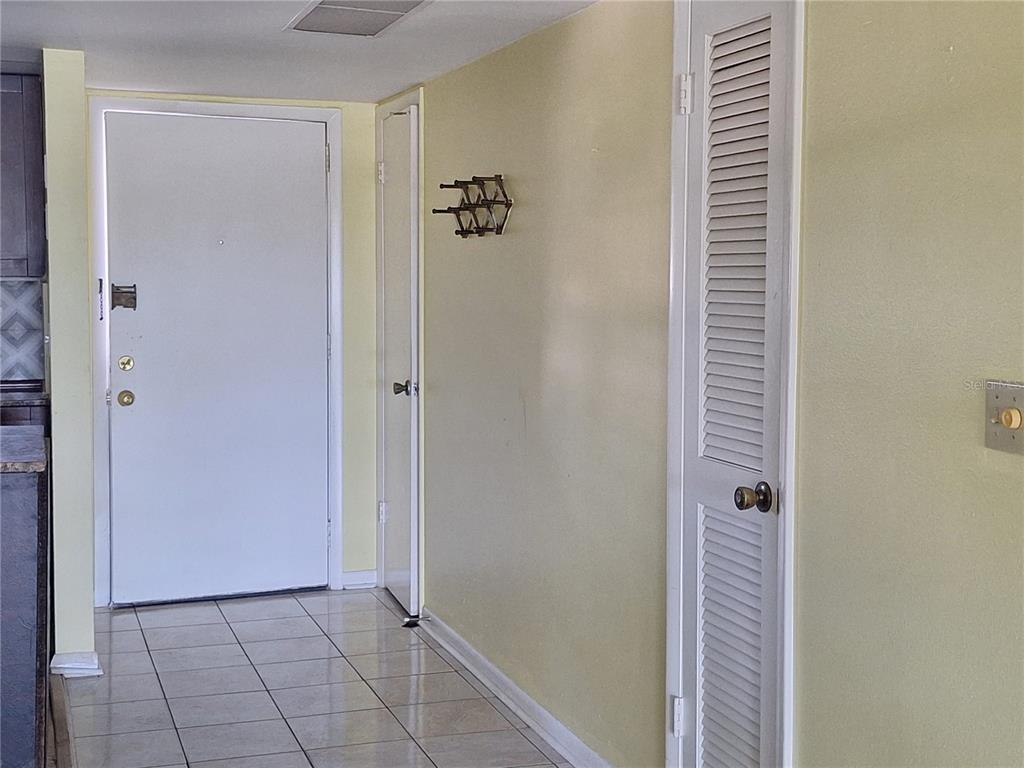4518 Garnet Drive, Unit 202 New Port Richey, FL 34652 - Photo 13 of 66 a view of a hallway with closet and bathroom