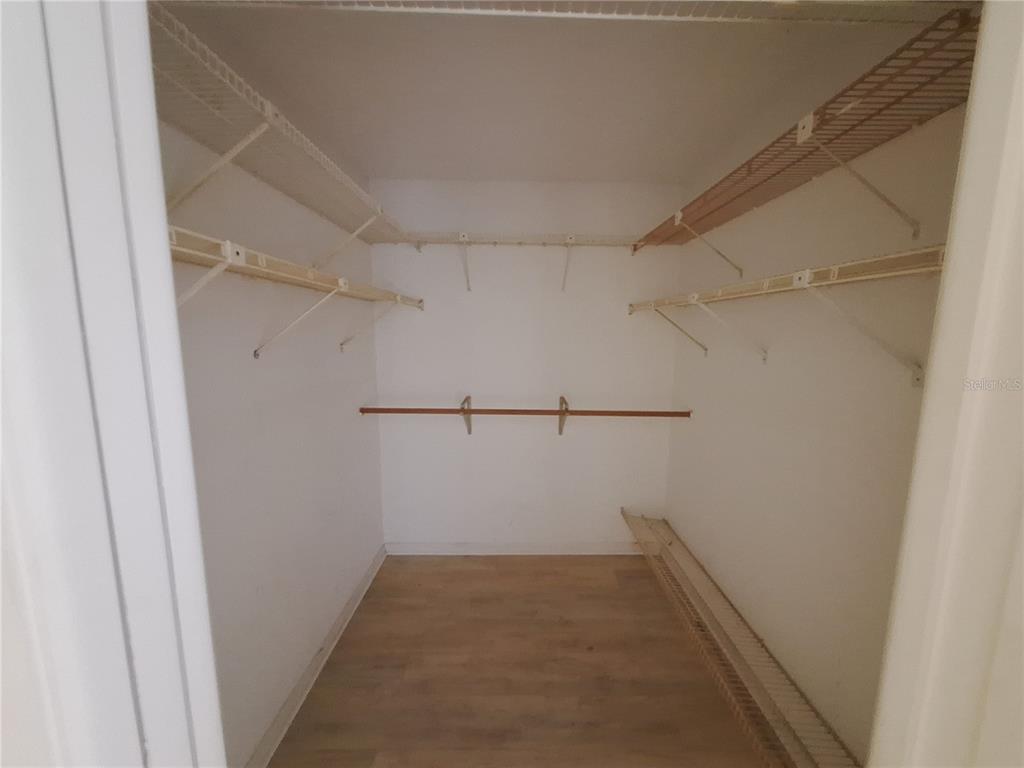 4518 Garnet Drive, Unit 202 New Port Richey, FL 34652 - Photo 26 of 66 a view of a room with racks on the wall
