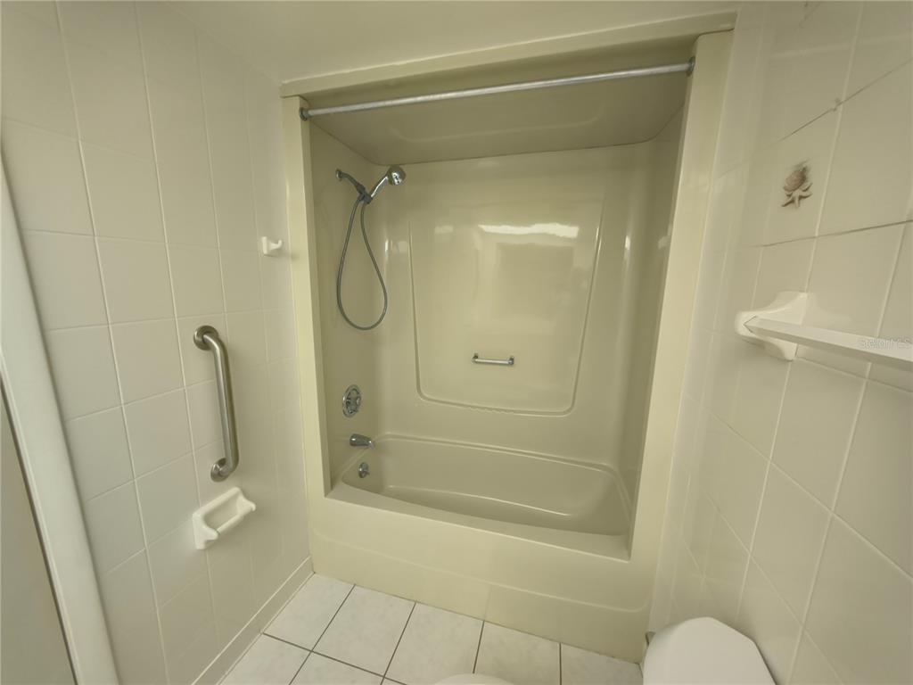 4518 Garnet Drive, Unit 202 New Port Richey, FL 34652 - Photo 29 of 66 a bathroom with a shower