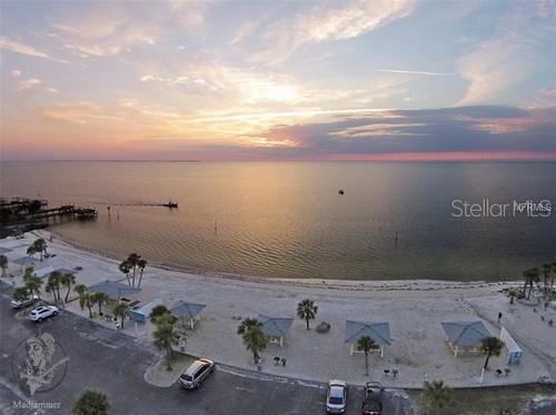 4518 Garnet Drive, Unit 202 New Port Richey, FL 34652 - Photo 54 of 66 an aerial view of a houses with outdoor space