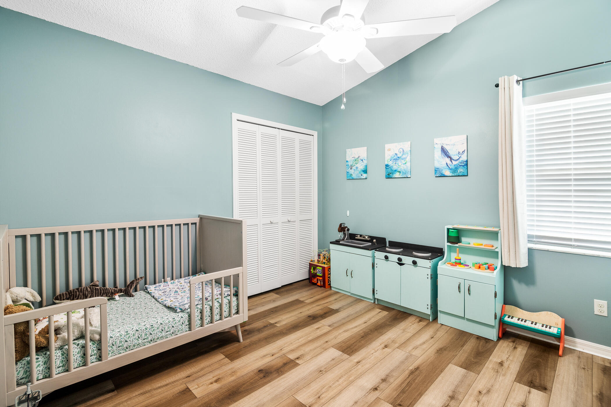 1197 Three Meadows Drive Rockledge, FL 32955 - Photo 18 of 25 a bedroom with furniture and a window