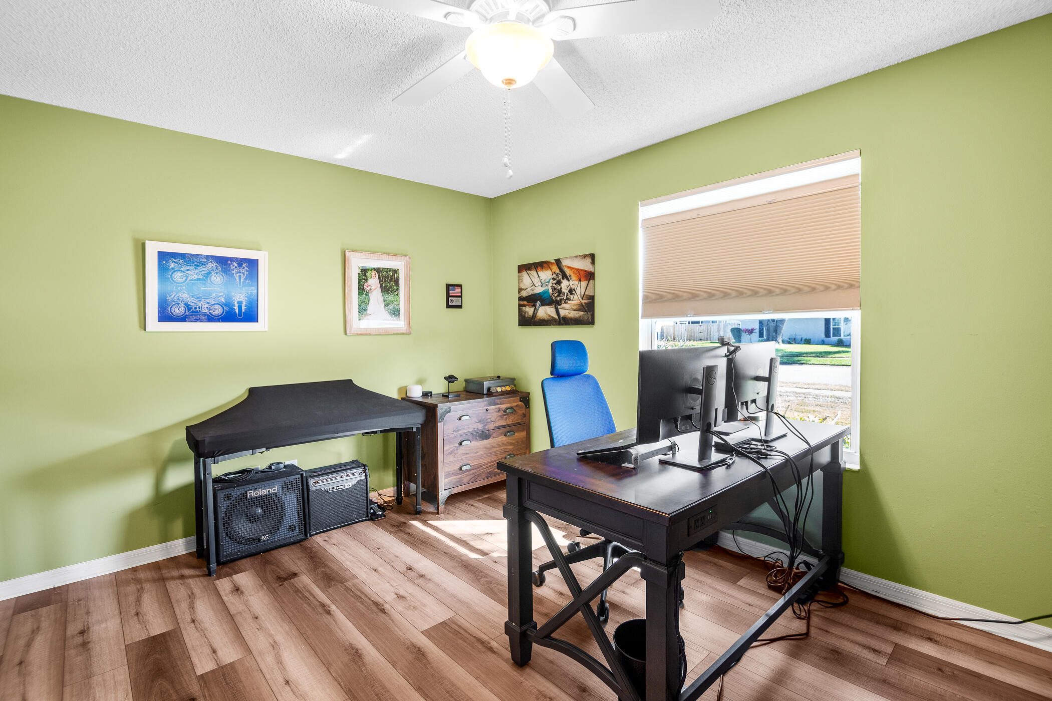 1197 Three Meadows Drive Rockledge, FL 32955 - Photo 20 of 25 a view of a workspace with furniture and a window