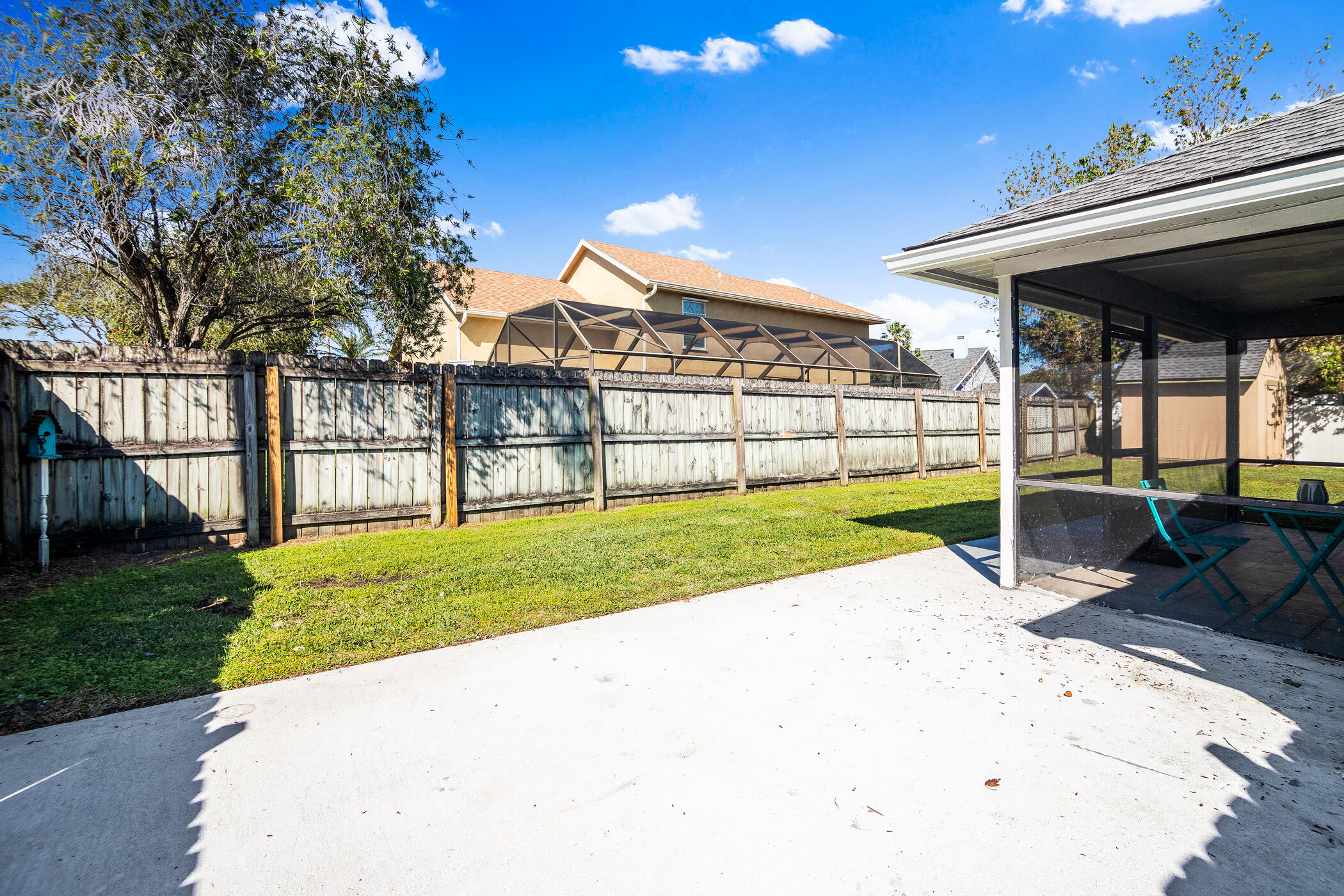 1197 Three Meadows Drive Rockledge, FL 32955 - Photo 22 of 25 a view of a house with a yard