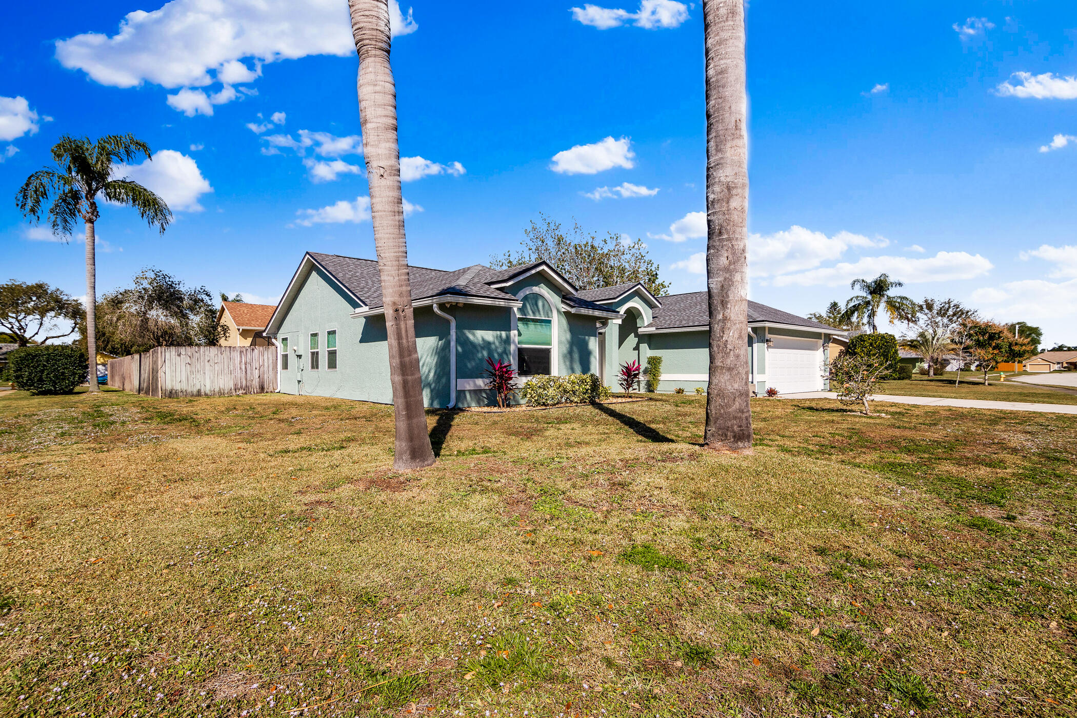 1197 Three Meadows Drive Rockledge, FL 32955 - Photo 3 of 25 a view of a house with backyard and sitting area