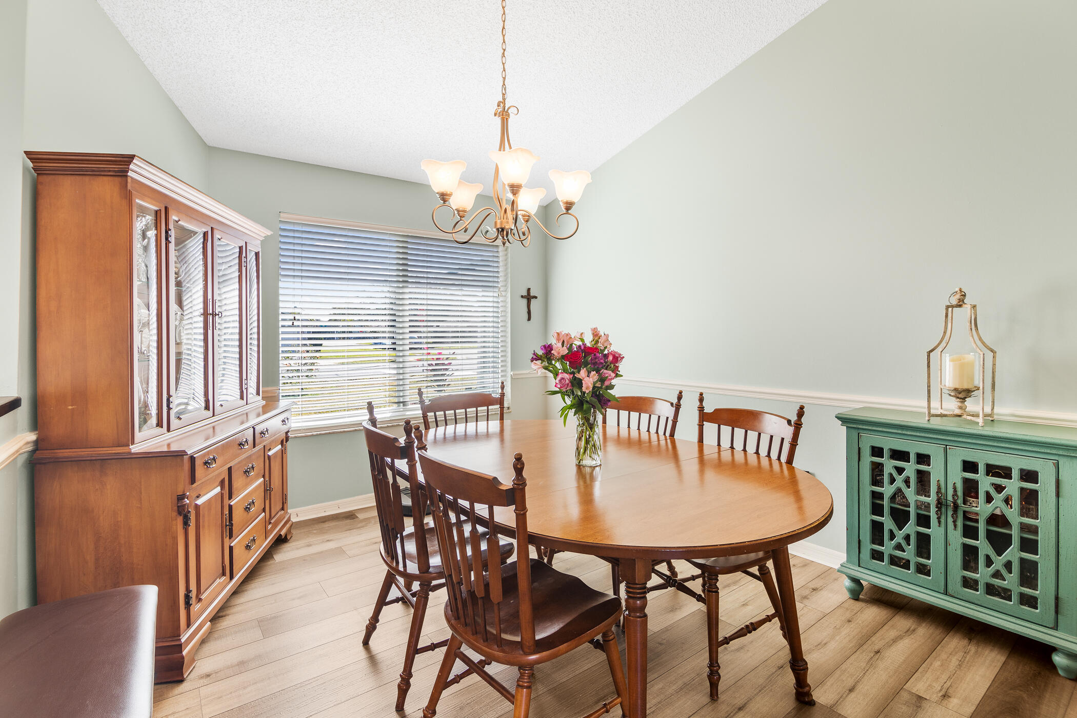 1197 Three Meadows Drive Rockledge, FL 32955 - Photo 5 of 25 a view of a dining room with furniture window and wooden floor