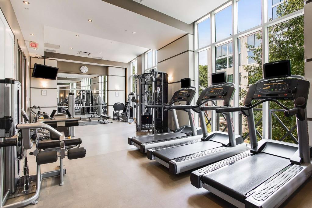 1820 Peachtree Road Northwest, Unit 1409 Atlanta, GA 30309 - Photo 38 of 44 a view of gym room with gym equipment