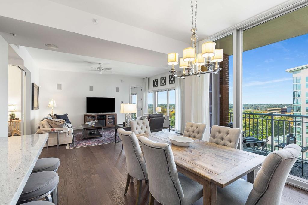 1820 Peachtree Road Northwest, Unit 1409 Atlanta, GA 30309 - Photo 5 of 44 a view of a dining room with furniture window and outside view