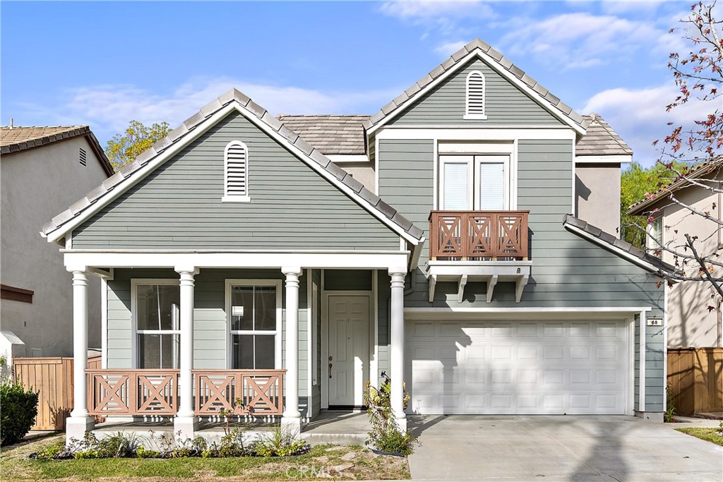 68 Kyle Court Ladera Ranch, CA 92694 - Photo 1 of 33 a front view of a house with a yard