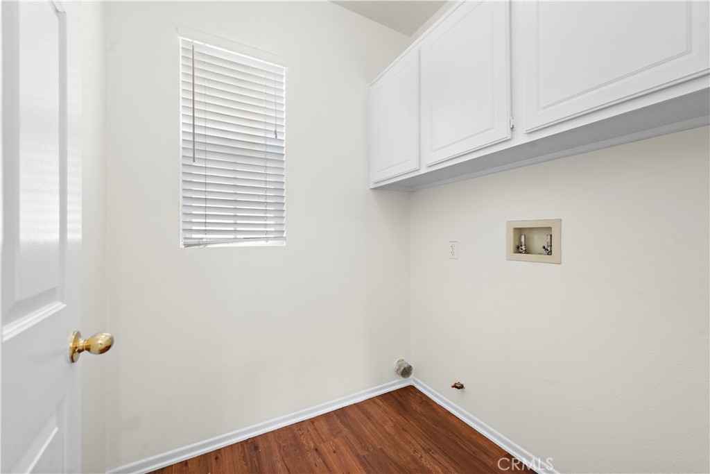 68 Kyle Court Ladera Ranch, CA 92694 - Photo 23 of 33 a view of small space with wooden floor and a window
