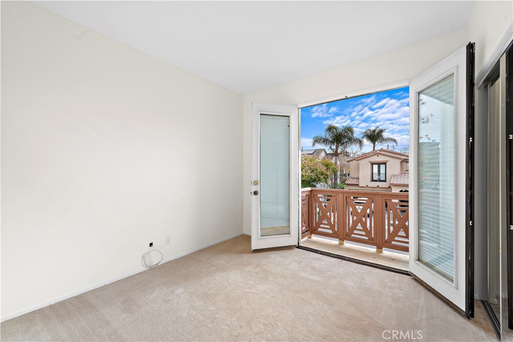 68 Kyle Court Ladera Ranch, CA 92694 - Photo 26 of 33 a view of a hallway to a bedroom