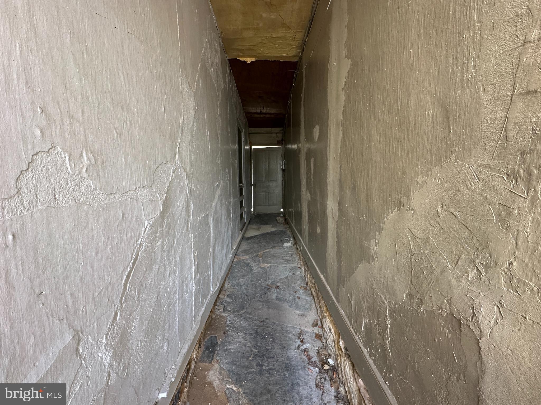 40 North Main Street Boonsboro, MD 21713 - Photo 17 of 75 a hallway with sliding door and yard in back