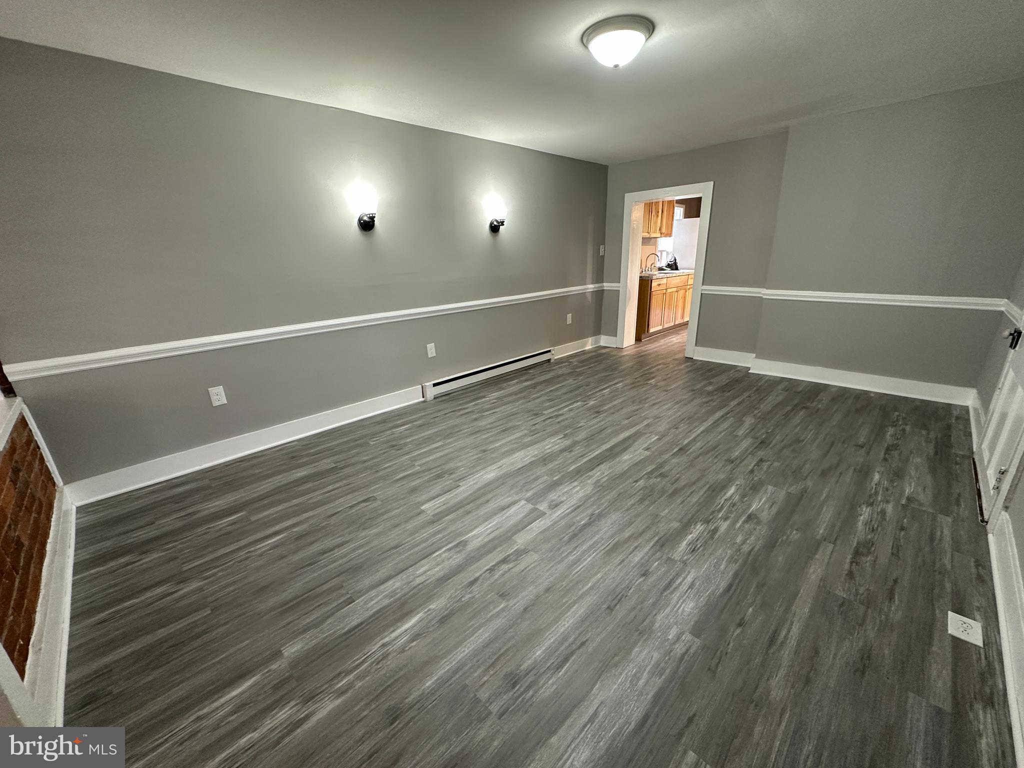 40 North Main Street Boonsboro, MD 21713 - Photo 25 of 75 an empty room with wooden floor and windows