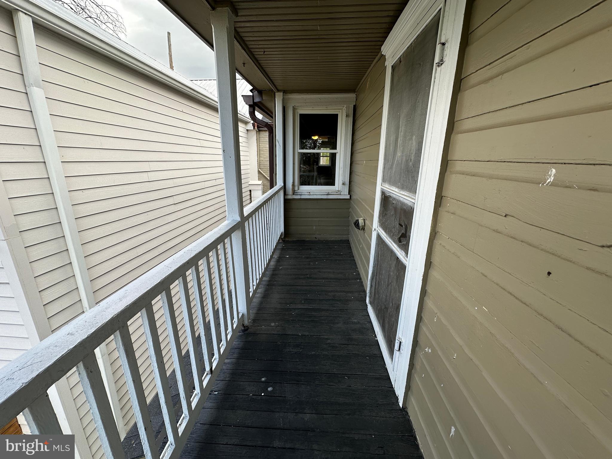 40 North Main Street Boonsboro, MD 21713 - Photo 61 of 75 a view of a porch with wooden floor