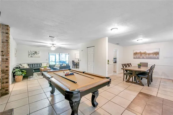 a bedroom with a bed and a table