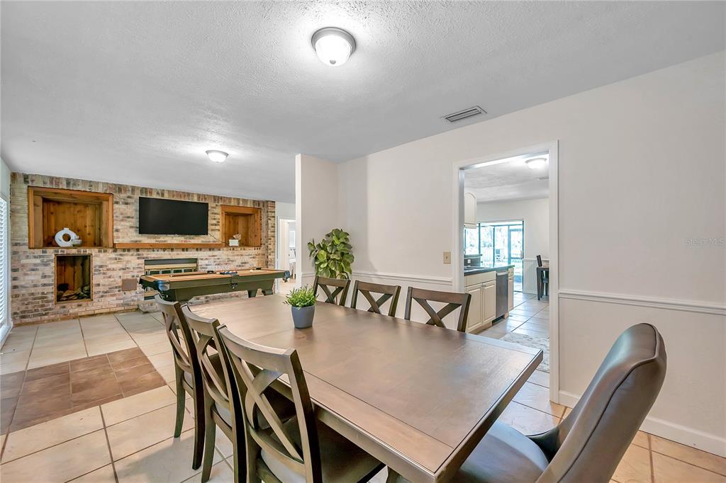 7405 Williams Road Seffner, FL 33584 - Photo 22 of 100 a view of a dining room with furniture