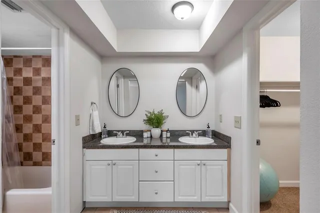 a view of a dining room with furniture and window