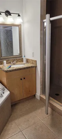 a white toilet sitting next to a small window