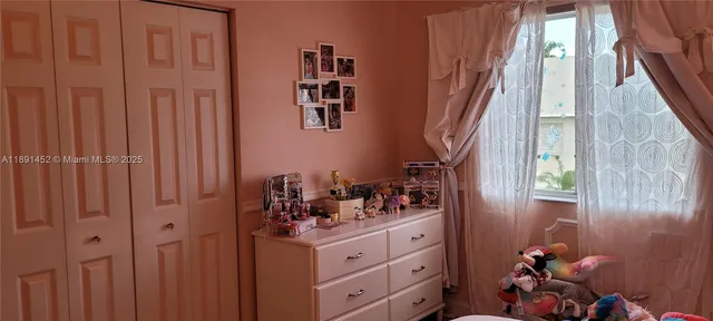 a bathroom with a sink toilet tub and shower