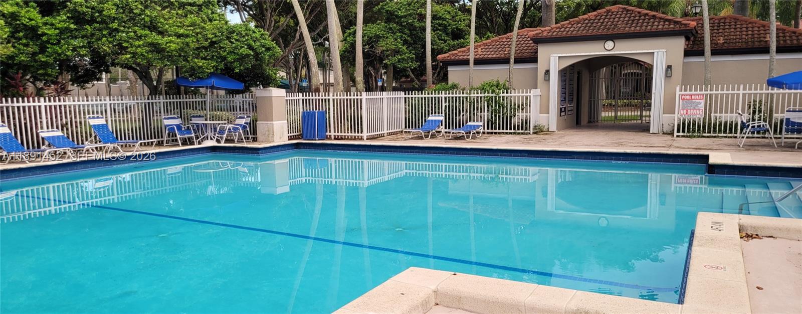 13661 Southwest 119th Avenue Miami, FL 33186 - Photo 24 of 36 a view of swimming pool with outdoor seating and deck