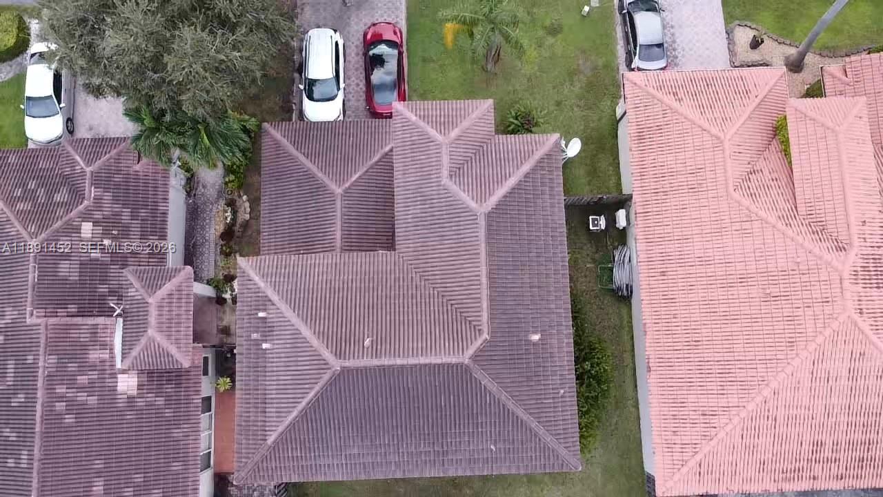 13661 Southwest 119th Avenue Miami, FL 33186 - Photo 30 of 36 a aerial view of a house with a yard