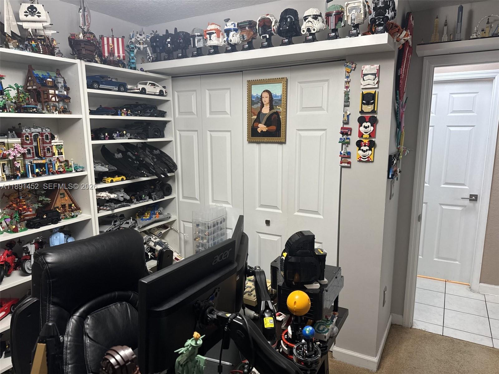 13661 Southwest 119th Avenue Miami, FL 33186 - Photo 9 of 36 a kitchen with a refrigerator and a stove