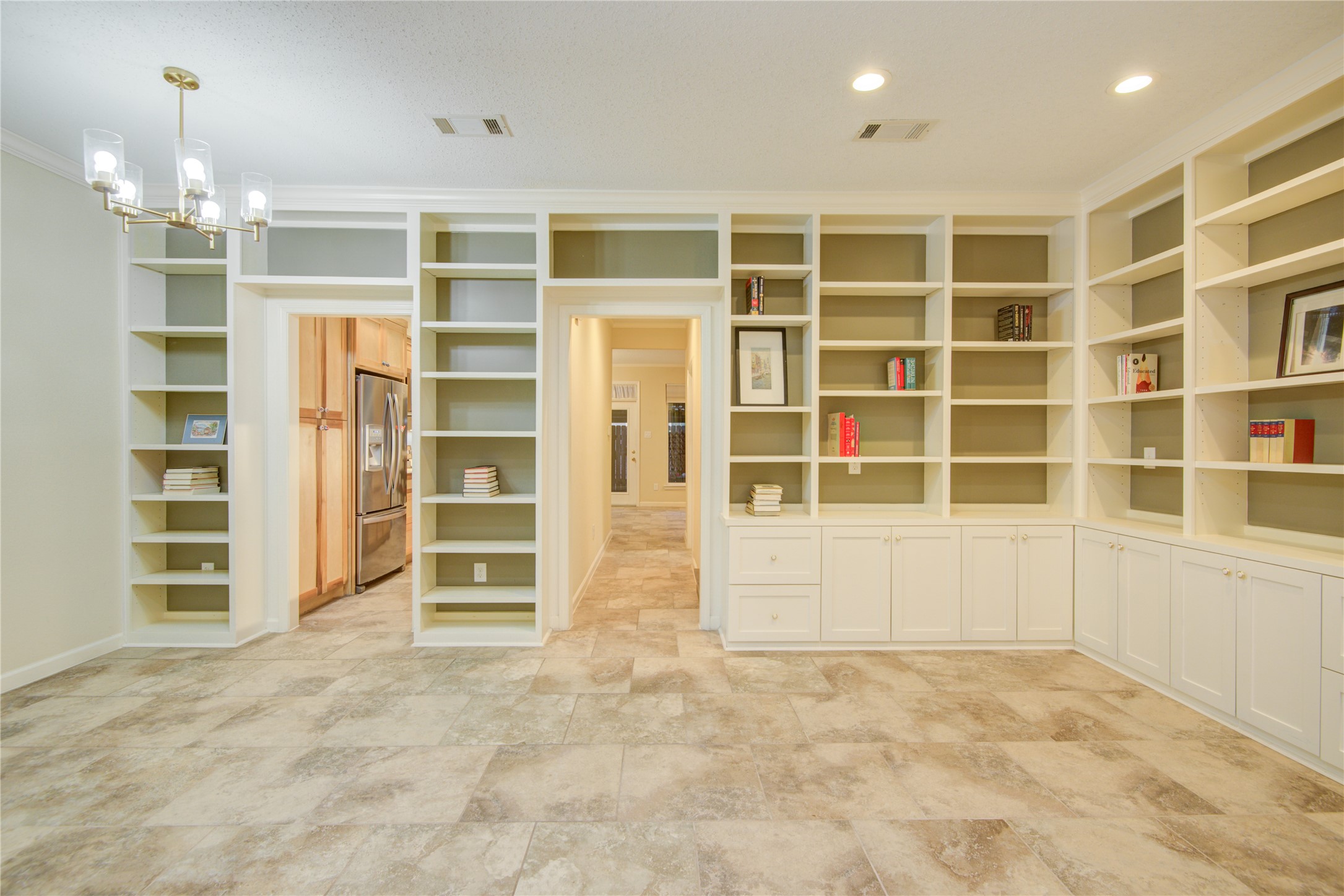 7449 Brompton Street, Unit 7449 Houston, TX 77025 - Photo 13 of 46 a view of an empty room with a window