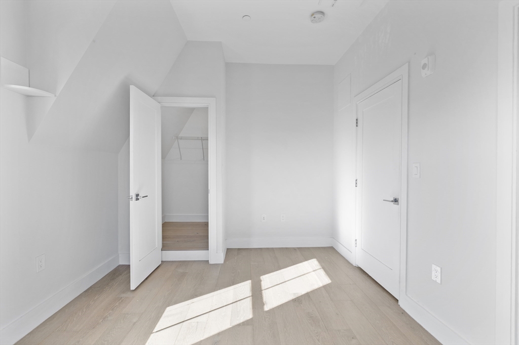 24 Rush Street, Unit G Somerville, MA 02145 - Photo 11 of 22 a view of an empty room