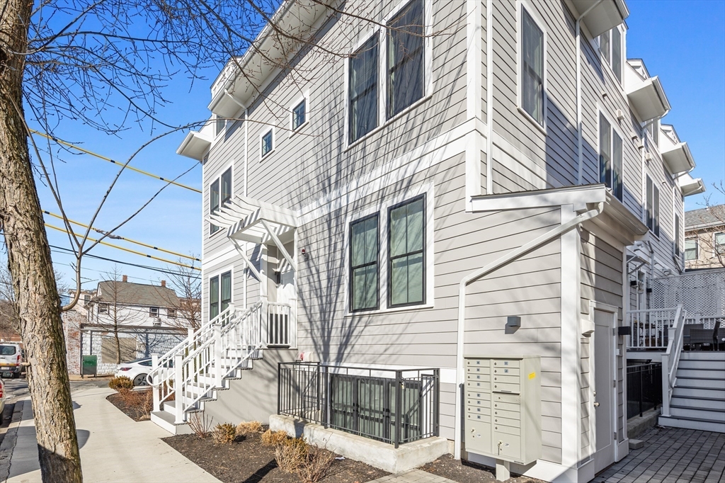 24 Rush Street, Unit G Somerville, MA 02145 - Photo 18 of 22 a front view of a house