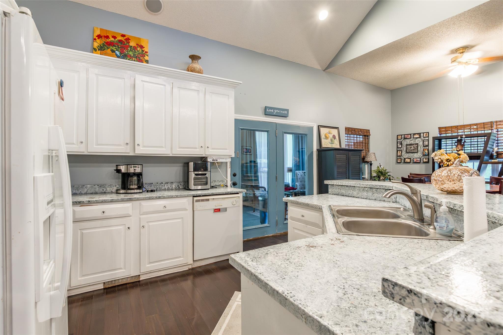 880 Columbia Road Chester, SC 29706 - Photo 13 of 40 a large kitchen with kitchen island granite countertop a sink and cabinets