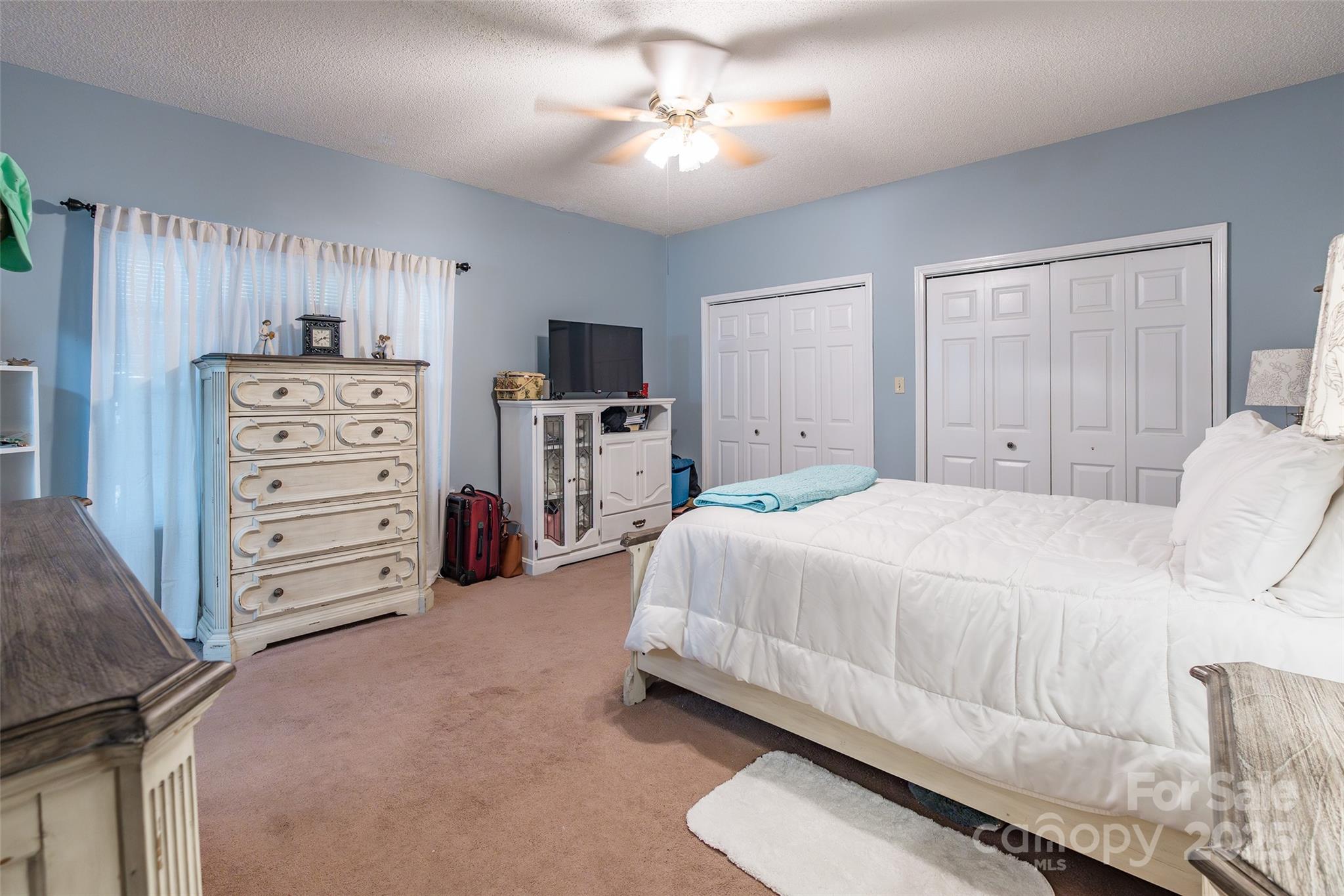 880 Columbia Road Chester, SC 29706 - Photo 15 of 40 a bedroom with a bed and a television