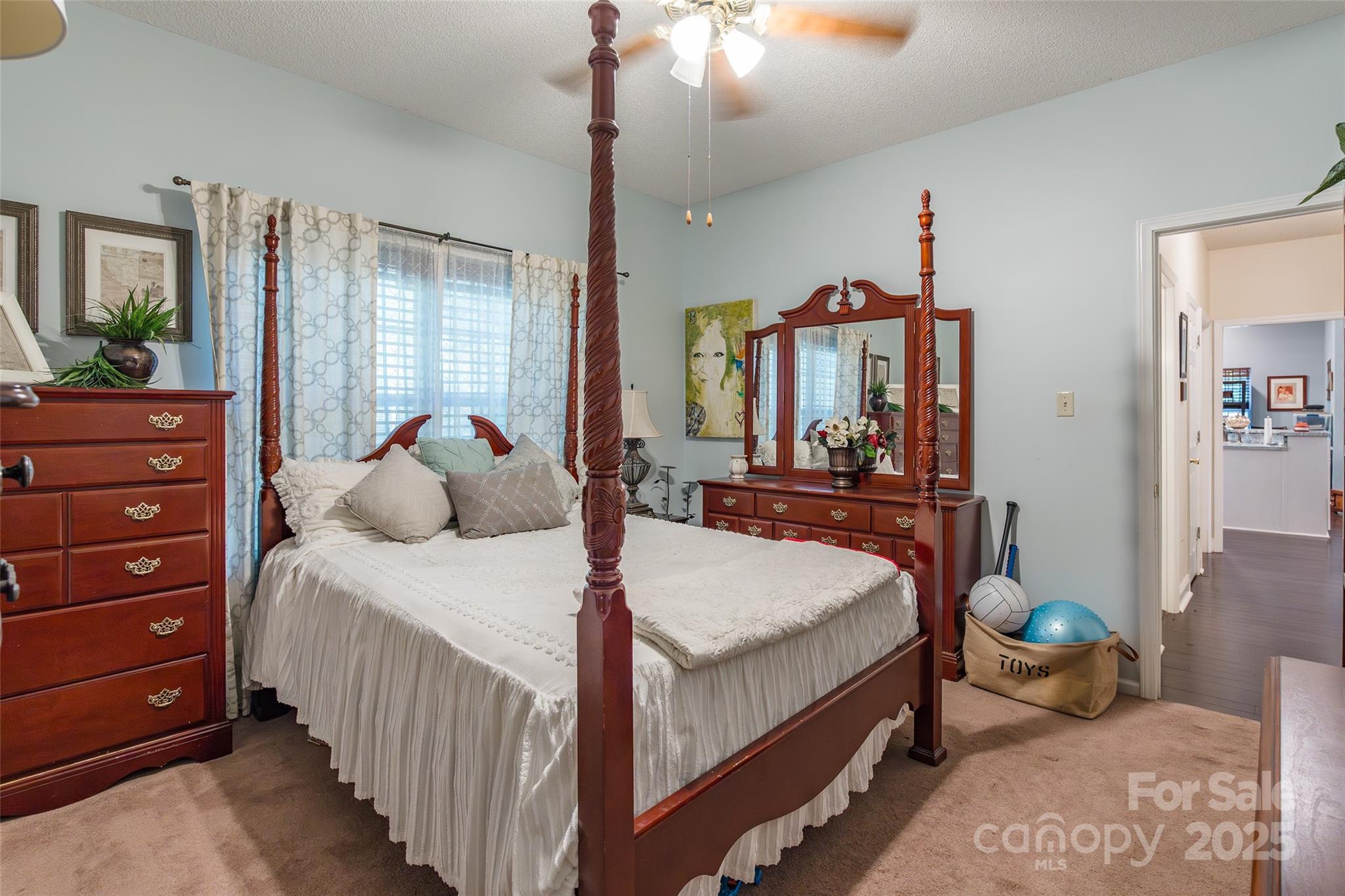 880 Columbia Road Chester, SC 29706 - Photo 20 of 40 a bedroom with a bed and large windows